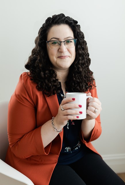 Dr. Lauren Fogel Mersy image holding coffee mug